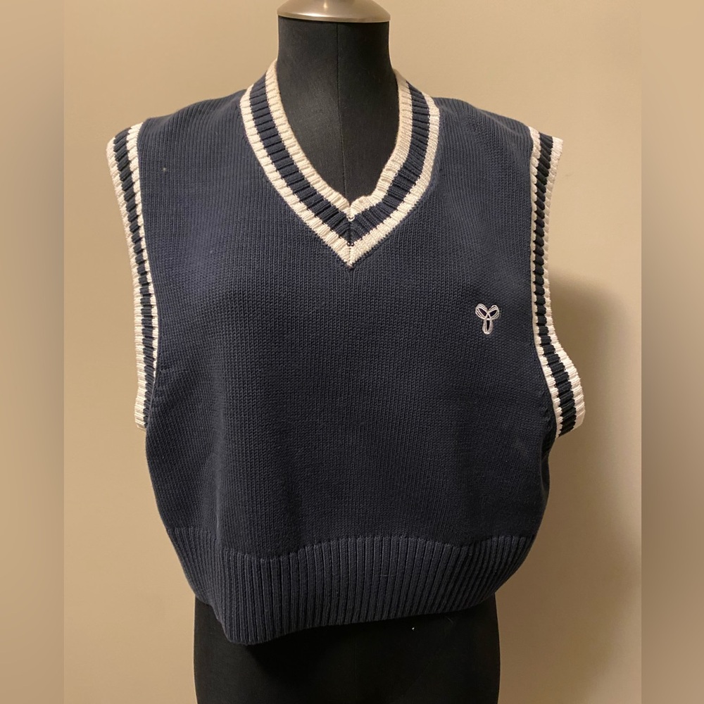 Large women’s TNA navy v-neck sweater vest with white border